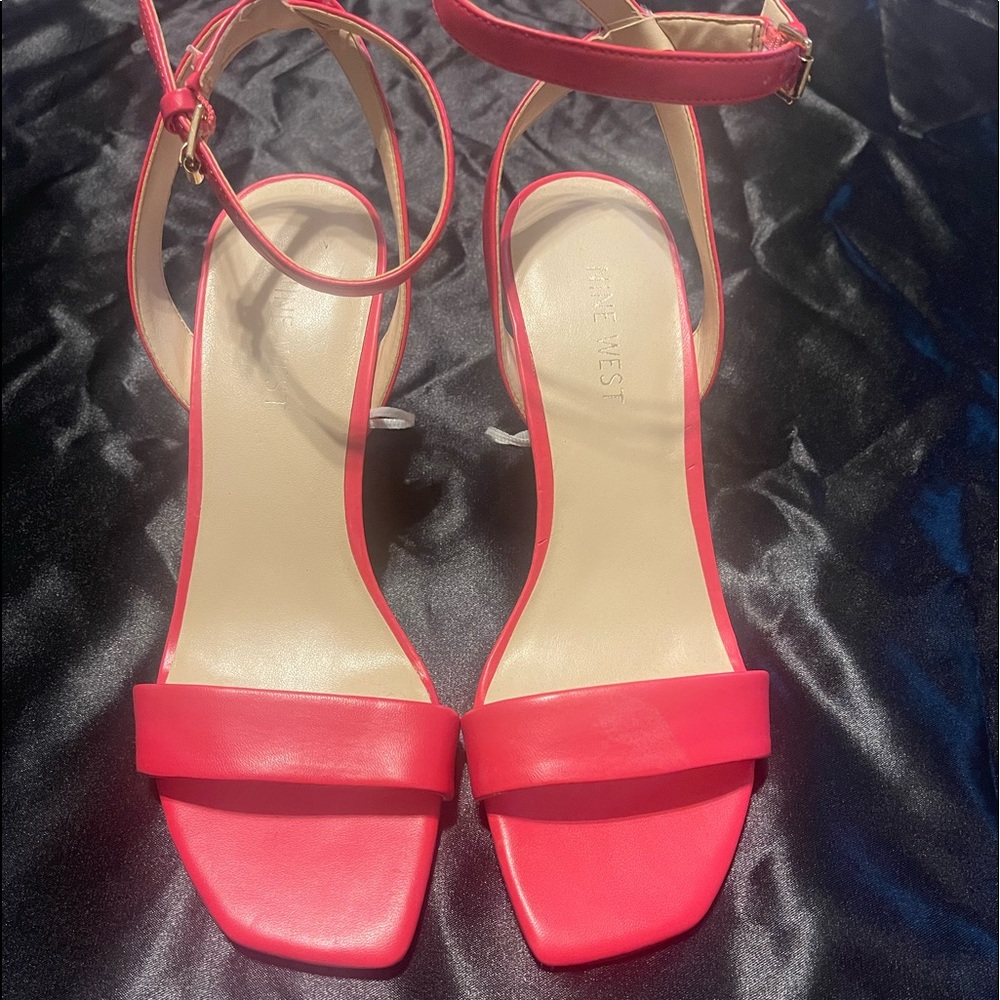 Women size 7 Nine West Coral Heels. Never worn. 3 inch open toe sandal heels.